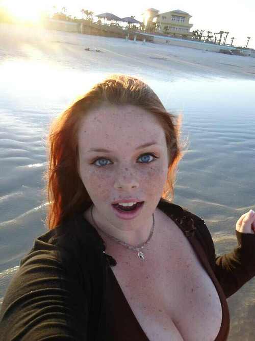 Sexy redhead with tons of freckles picture