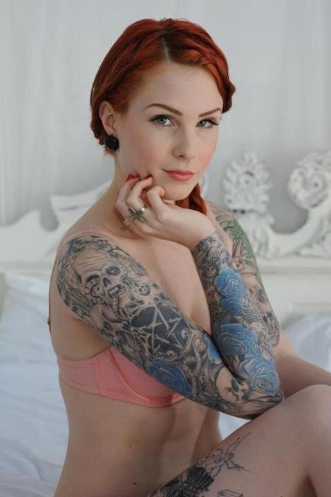 Smoking redhead hith tattoos picture