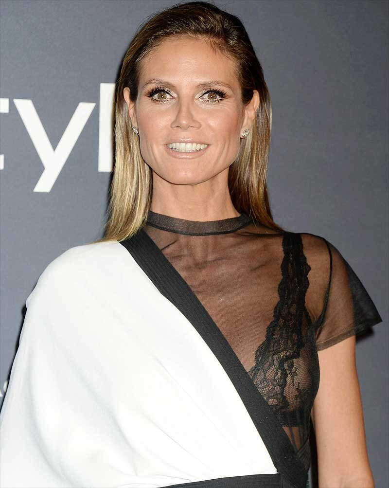 Heidi Klum Single Nipple Peek in Black Bra picture