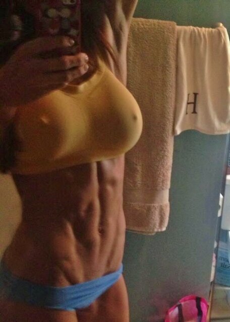 Jaimie Bernhardt - yellow tight top, blue bottoms selfie picture