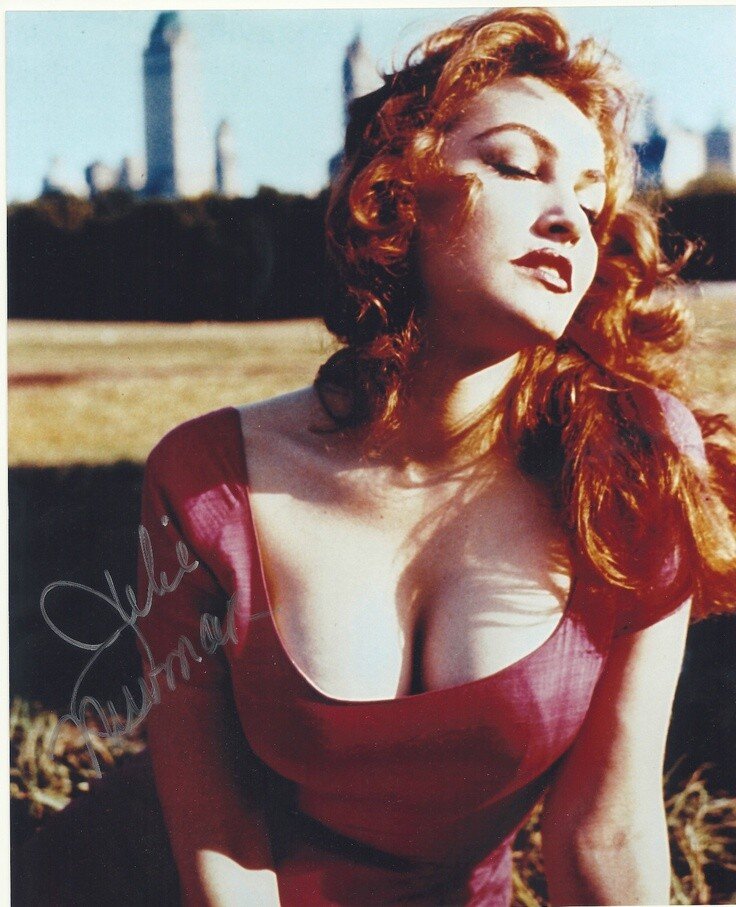 Julie Newmar showing great cleavage picture