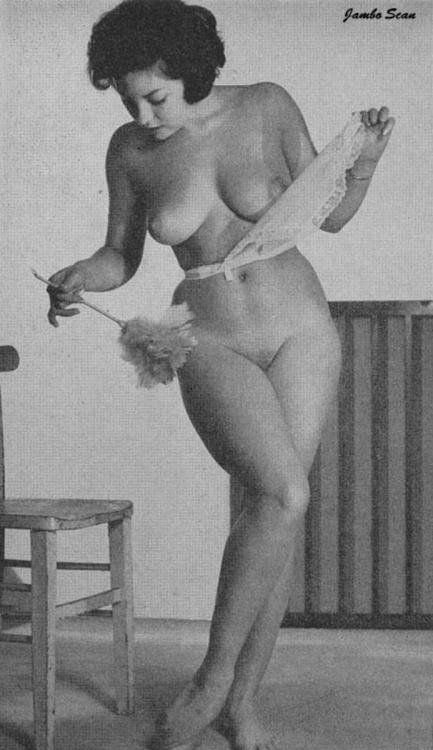 June Palmer enjoys performing domestic chores in the buff. picture