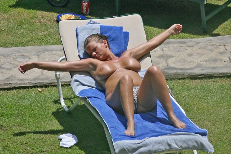Kerry Katona sunbathing topless picture