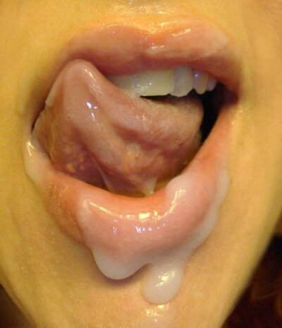 Hubby loves it when I kiss him with a mouth full of cum. picture
