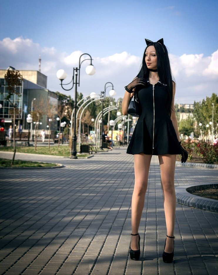 Cute kitty brunette bimbo on the street picture