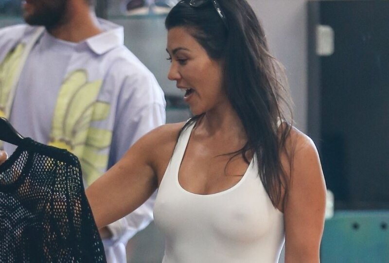 Braless celeb Kourtney Kardashian hard nipples in public picture