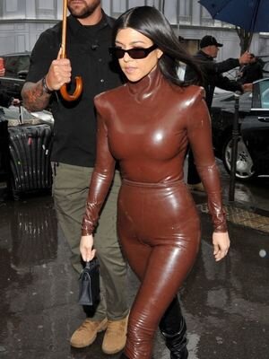 Kourtney Kardashian in tight latex suit leaving Sunday Service in Paris picture