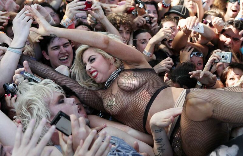 Lady Gaga crowd surfs and is groped. picture