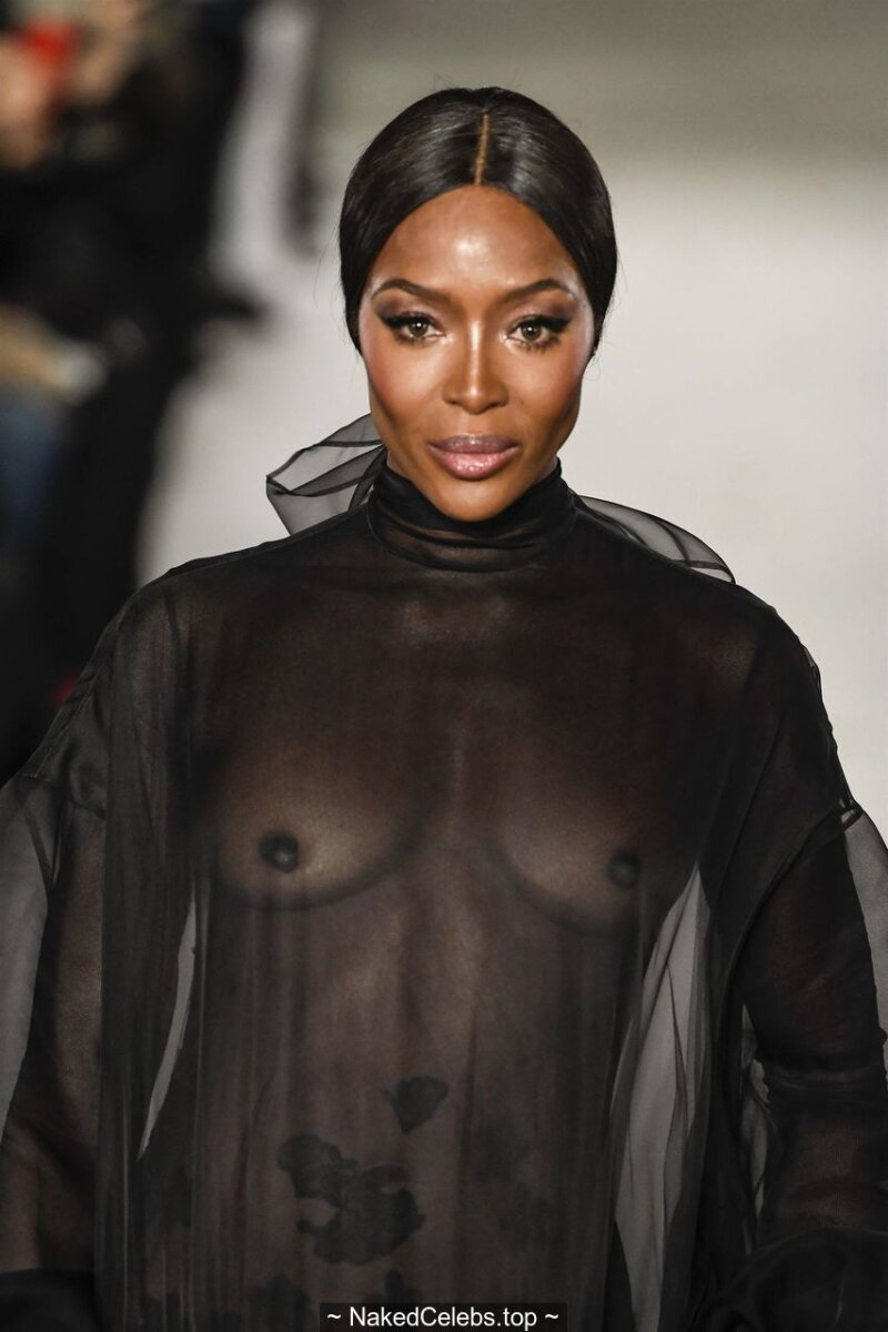 Naomi Campbell topless in see through dress picture