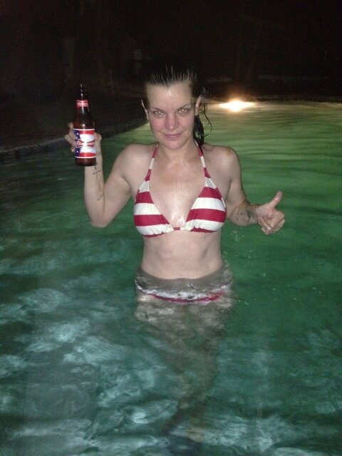 Pauley Perrette in a bikini in a pool picture
