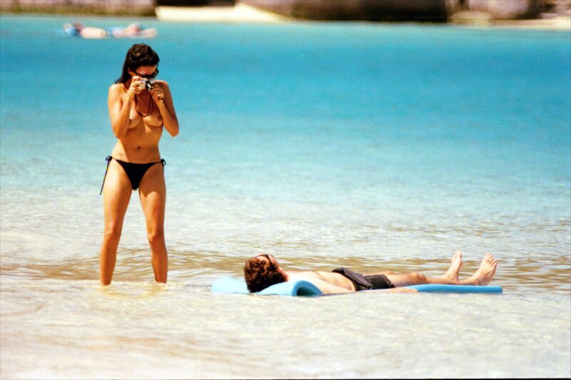 Penelope Cruz topless on a beach picture