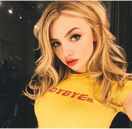 Peyton list is looking sexy as hell with big boobs in tight yellow shirt revealing her bra picture