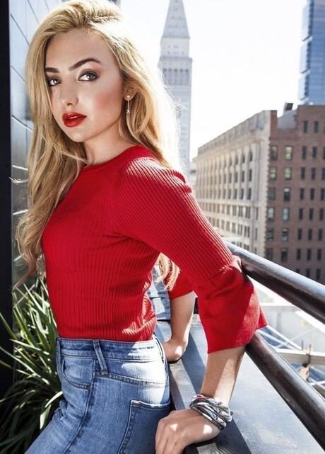 Peyton list is looking sexy as hell with big boobs in tight red shirt revealing her bra picture