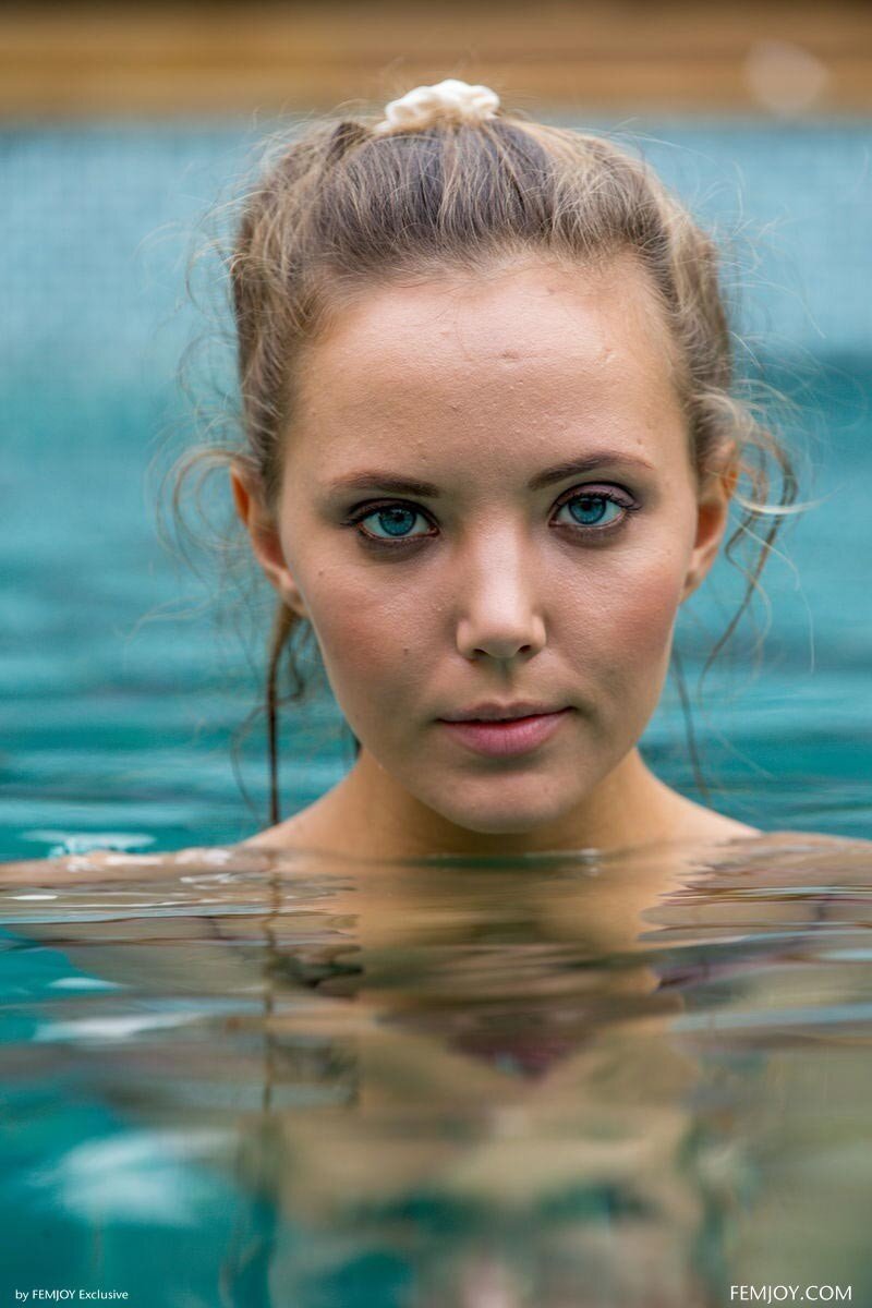 Brunette Model Clover having Fun in a Pool picture