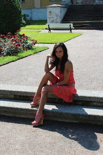 Pink princess sitting outdoor on a stairs picture