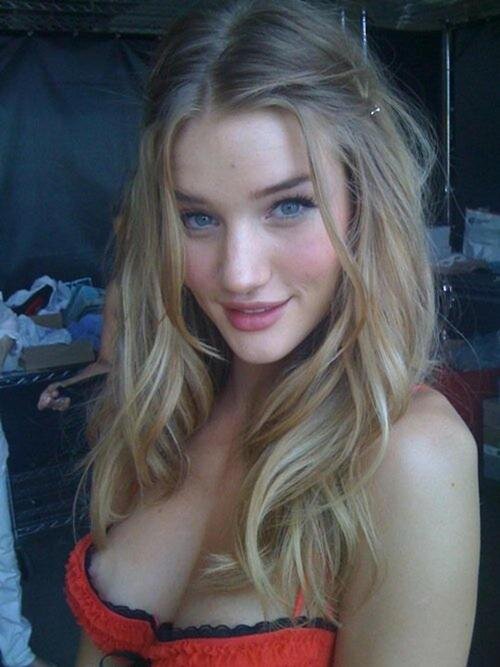 celebrityskin:Rosie Huntington-Whiteley slipping a lil’ nip picture