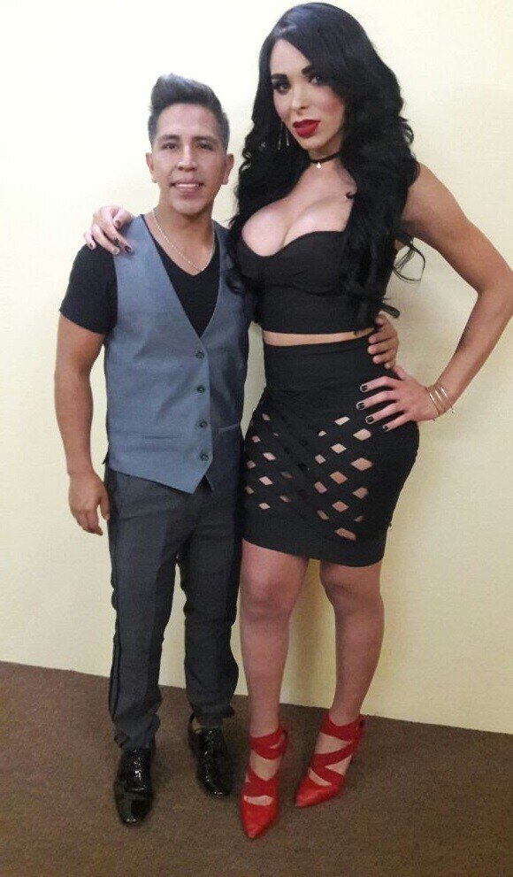 Alexis La Vega holds an exceptionally tine 4 foot 2 4"2' who is her paying Jon for the night - SGB holdd picture