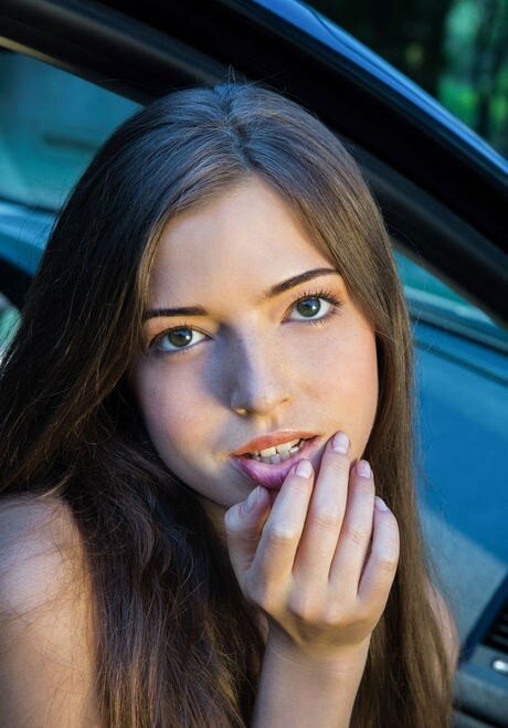 Hot teen brunette Taliah Mac poses nude by open passengers side door of vehicle 16 picture
