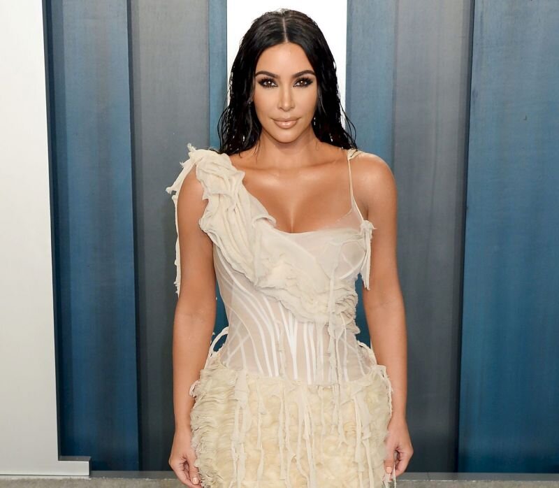 Kim Kardashian sexy see through dress showing nice cleavage with her big tits at the Vanity Fair Oscar Party with Kanye West. picture