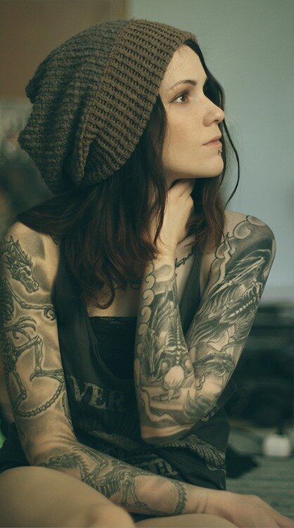 Sad emo babe tattoo in beautiful picture with alot of tattoos on the body picture