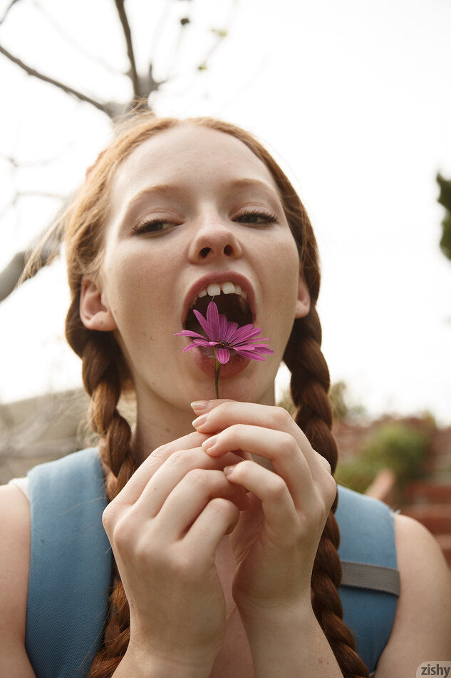 Silly redhead Wendy Patton with braided pigtails picture