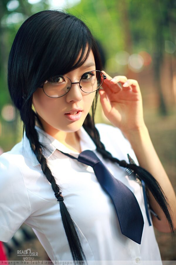 Cute asian schoolgirl doing her teacher picture