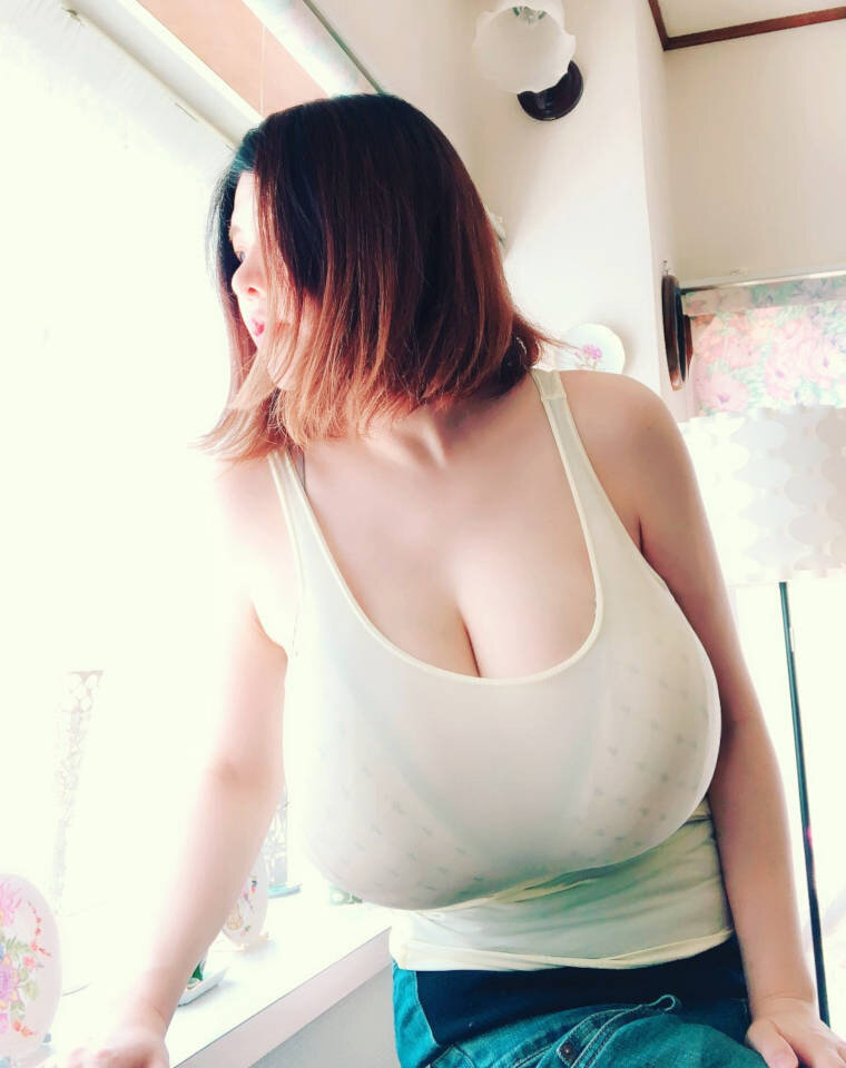 XXXL overflowing asian boobs picture