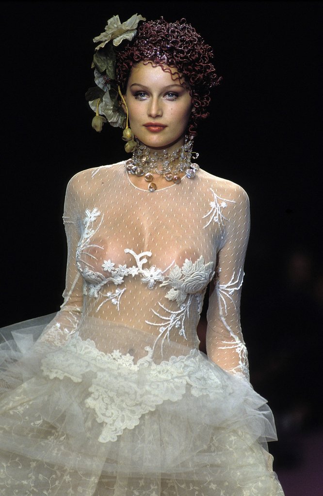 French actress and model Laetitia Casta nude boobs under see through dress runway photo picture