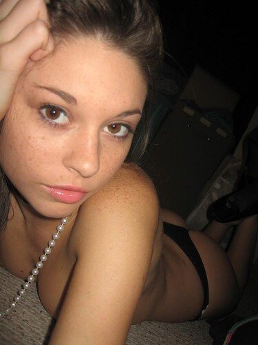 Sexy teen is lying on the floor picture