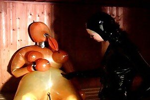 Latex Slaves Get Completely Confined picture