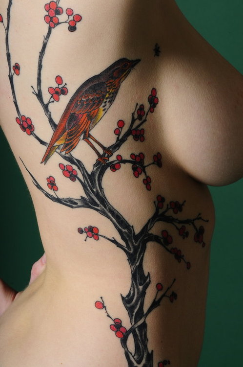 Beautiful body in this breathtaking tattoo photo picture